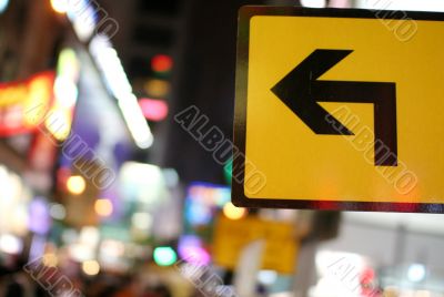 Yellow Sign With Arrow