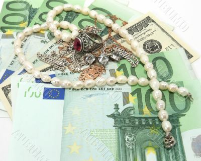 Jewelry on money background