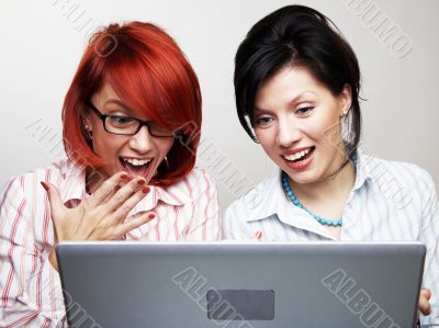 Two businesswomen are very surprised