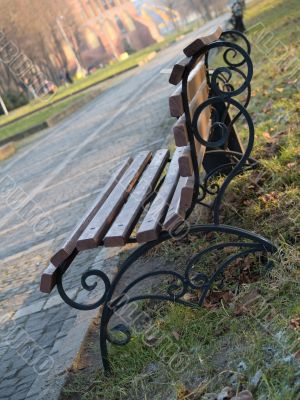 Lonely bench in the autumn park
