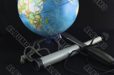 globe and a spyglass