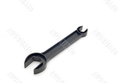 black spanner on white