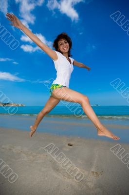 happy jump at the beach