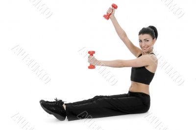 beautiful girl with dumbbells