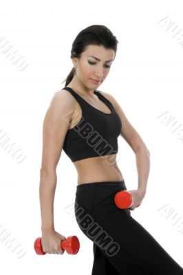 beautiful girl with dumbbells