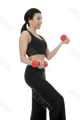 beautiful girl with dumbbells