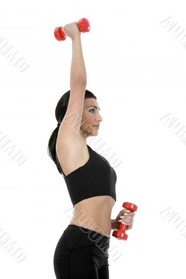 beautiful girl with dumbbells