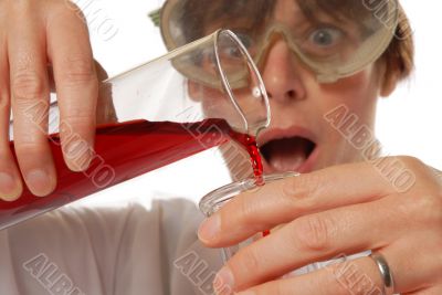 horrified lady technician pouring liquid