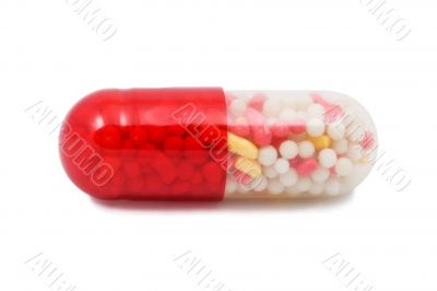 red and white capsule pill isolated