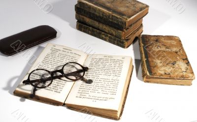 antique books and spectacles