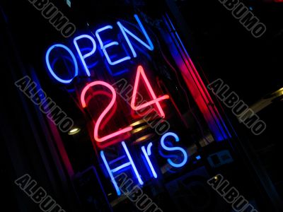 neon `Open 24 hours` sign