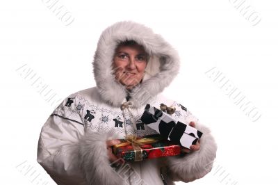 mature woman with winter coat and presents