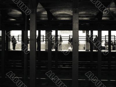 Passengers Waiting in New York City Subway Station