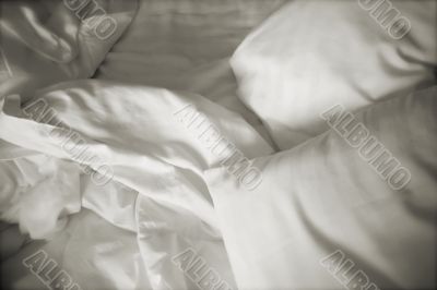 White Sheets On Bed