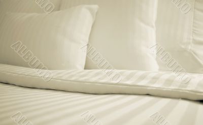 White Sheets On Bed