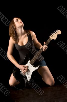 Ecstatic rock guitarist woman
