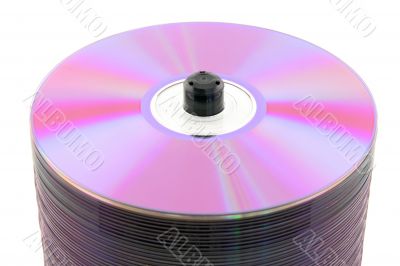 Close-up of purple DVDs on spindle Close-up of purple DVDs on spindle