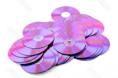 Pile of colorful DVDs or CDs on white background