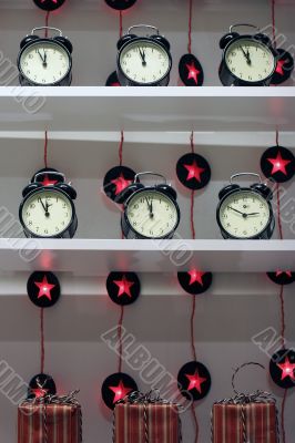 Several alarm clocks