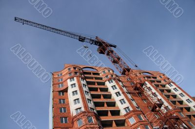 Construction of a new multi-storey brick building.