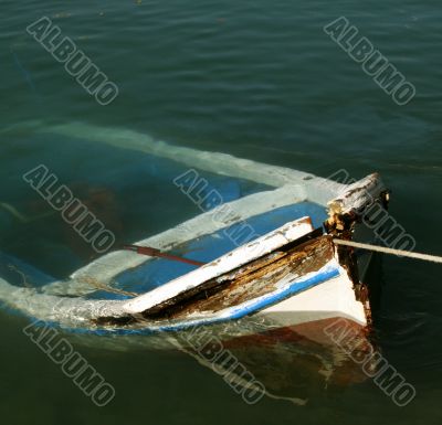 old sunken rowing boat