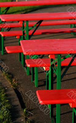 red summer party tables and red chairs