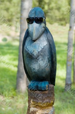 Wooden sculpture of the raven