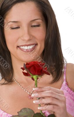 Portrait of a girl with a red rose