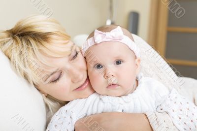Mother embrace her baby girl Mother embrace her baby girl