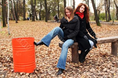 Red dustbin and girl`s portrait