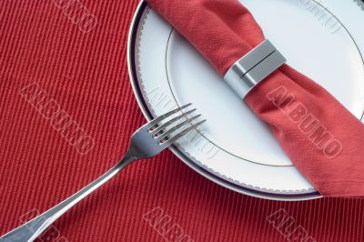 fork, plate and napkin