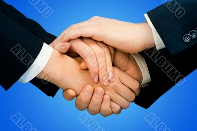 Handshake of two business partners