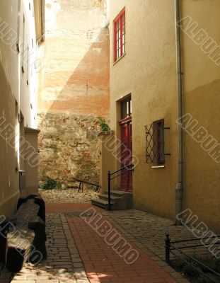 The cozy courtyard in a old town towards evening