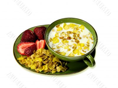 Cornflakes and milk on a white background