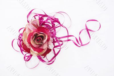 red artificial rose convoluted in purple tape 1