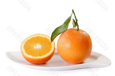 Fresh Oranges on a  plate