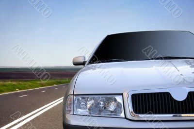 Fast car on the highway.closeup