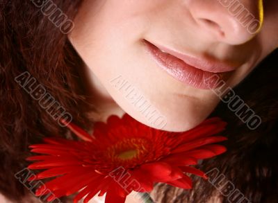 Girl with a red flower