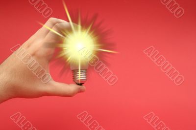 Background with lit lightbulb
