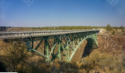 Old iron bridge over the Crooked River Canyon Old iron bridge over the Crooked River Canyon