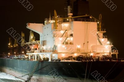 moored cargo ship at a port