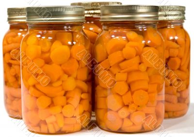 Five Mason Jars With Carrots