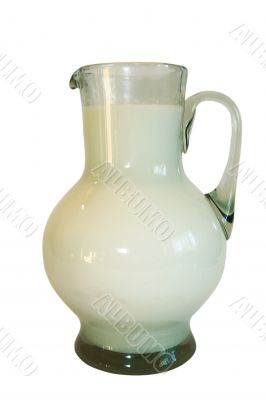 Jug filled by milk