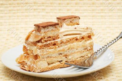 Piece of caramel meringue cake