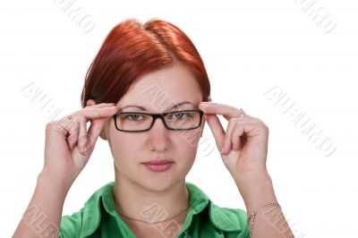 Redheaded girl with glasses