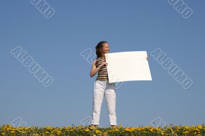 Girl holding blank banner with copy space