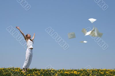 Laughing girl frees herself from paperwork