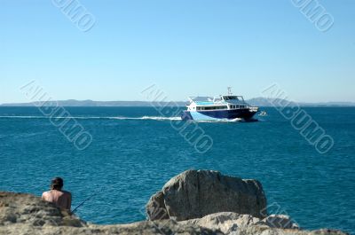 Fisher and boat