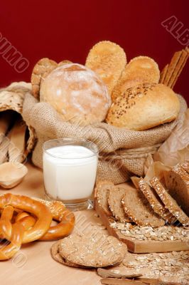 Assortment of baked breads and prezells with yoghurt