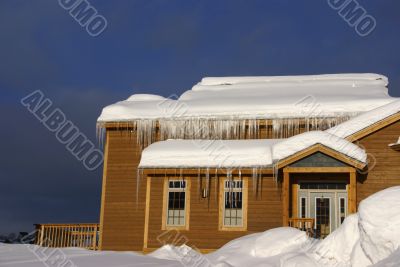 Large icicles on Townhouses after heavy snowstorm